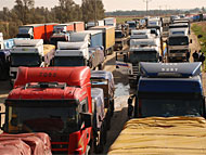 Trucks with humanitarian aid entering the Gaza Strip