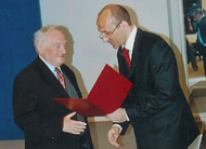 Noah Flug with The Prime Minister of Poland Marek Belka