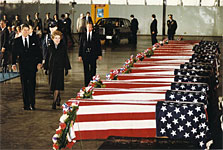 President Ronald Reagan and First Lady Nancy Reagan pay their respects to the caskets of the victims of the attacks