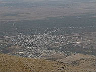 Druze village of Hader in Syria, viewed from the Golan Heights in Israel (photo by עופר 249 CC BY-SA 3.0)