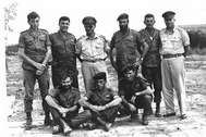 Sharon, top second from left, with members of Unit 101 after Operation Egged (November 1955).