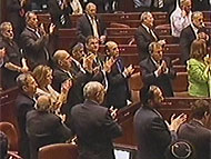 Sarkozy receiving applause at the Knesset