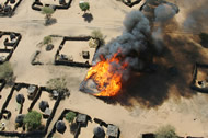 Burning Village in Sudan (Photo: Brian Steidle)