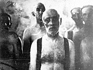 A group of Jewish men awaiting death in a gas van at the Chelmno death camp