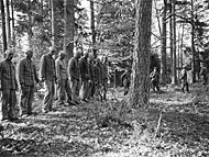 Prisoners from Buchenwald awaiting execution in the forest near the camp