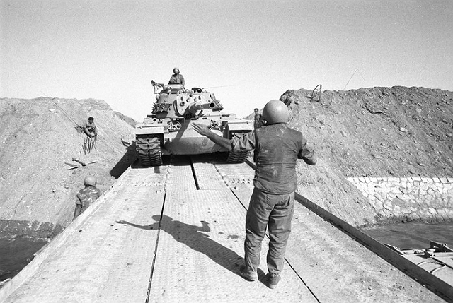 Israeli tanks cross the Suez Canal