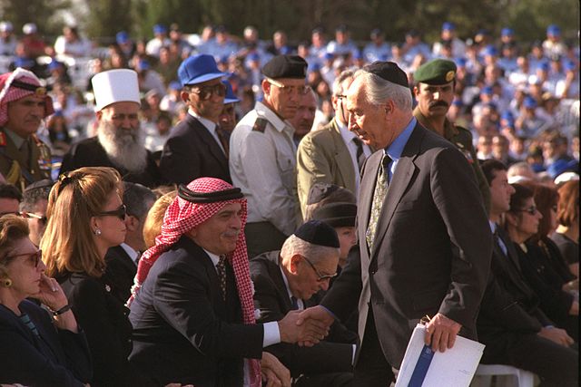 Peres and Hussein