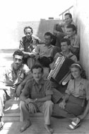 Haim Hefer (bottom center) with the Chizbatron, September 1949