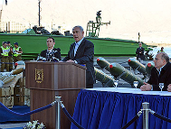 PM Netanyahu speaks besides the unloaded rockets, mortars and bullets found on the Klos-C Vessel. (photo credit: GPO, courtesy of the Prime Minister's Office)