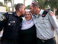 Druze mother and her two sons - one an officer in the IDF, the other an officer in Israeli Police Force.