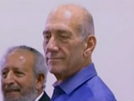 Olmert sentenced to six years in prison and a one-million shekel fine
