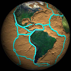 The Earth's crust is broken into a mosaic of moving tectonic plates.